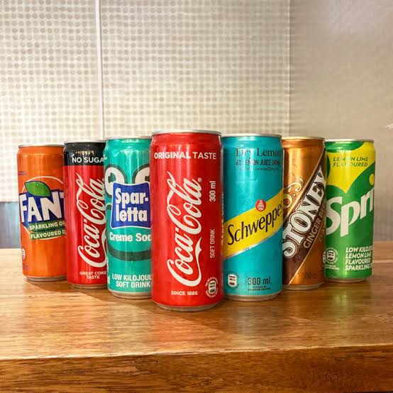 A variety of cold soft drinks in bottles